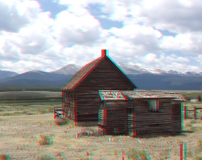 3D photo of a barn against the mountains in Colorado. 